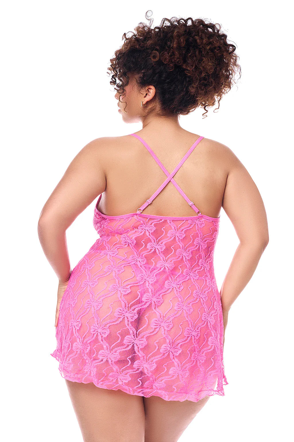 Curvy model posing in Cotton Candy Kisses Babydoll – sheer pink lace lingerie back view with ruffle trim | Curvy Bombshells
