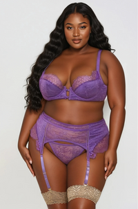 Plus size model wearing purple lace 3 piece lingerie set with underwire bra garter belt and g-string front view