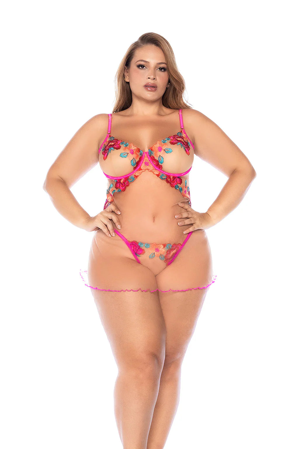 Plus size model wearing Seductive Garden Babydoll with sheer mesh, floral embroidery, and pink trim lingerie front view